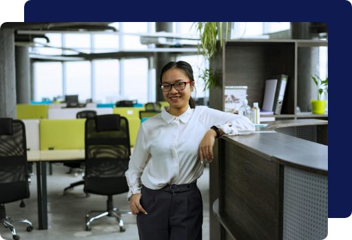 Professional woman in a clean, open-concept office building